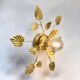 Vintage 1970s - 80s gold leaf metal flower wall light