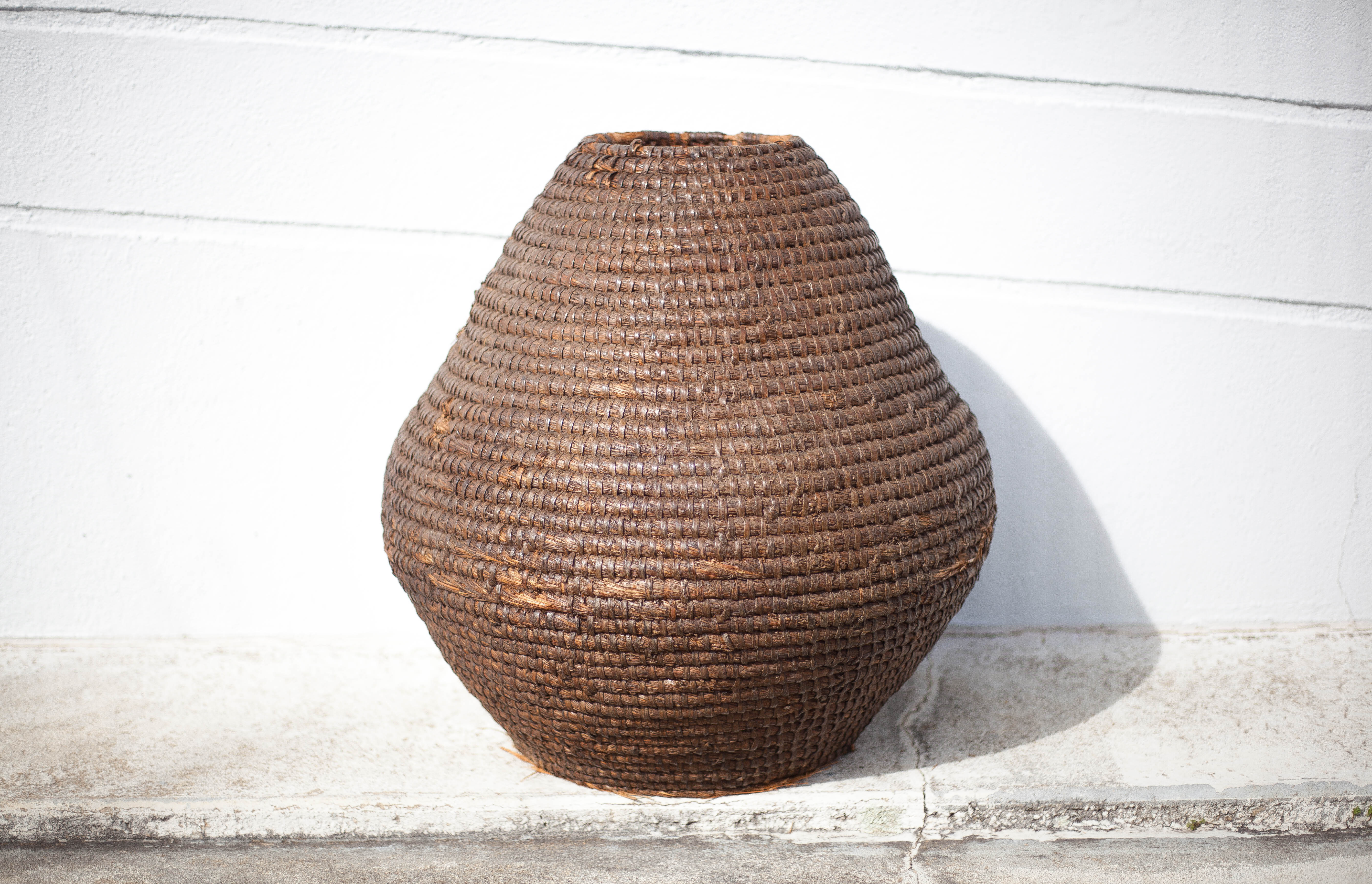 Old basket, straw and bramble bud