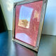 Metal frame in gold colored brass