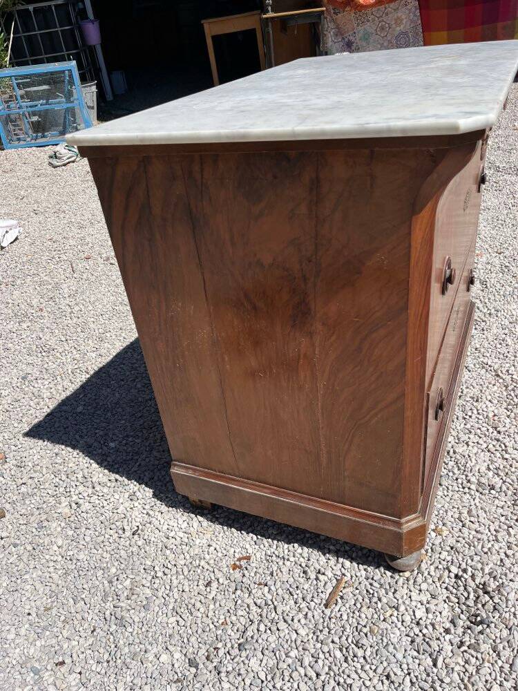 Commode with a white marble top