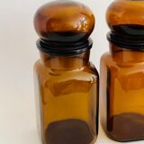 Pair of vintage amber glass jars