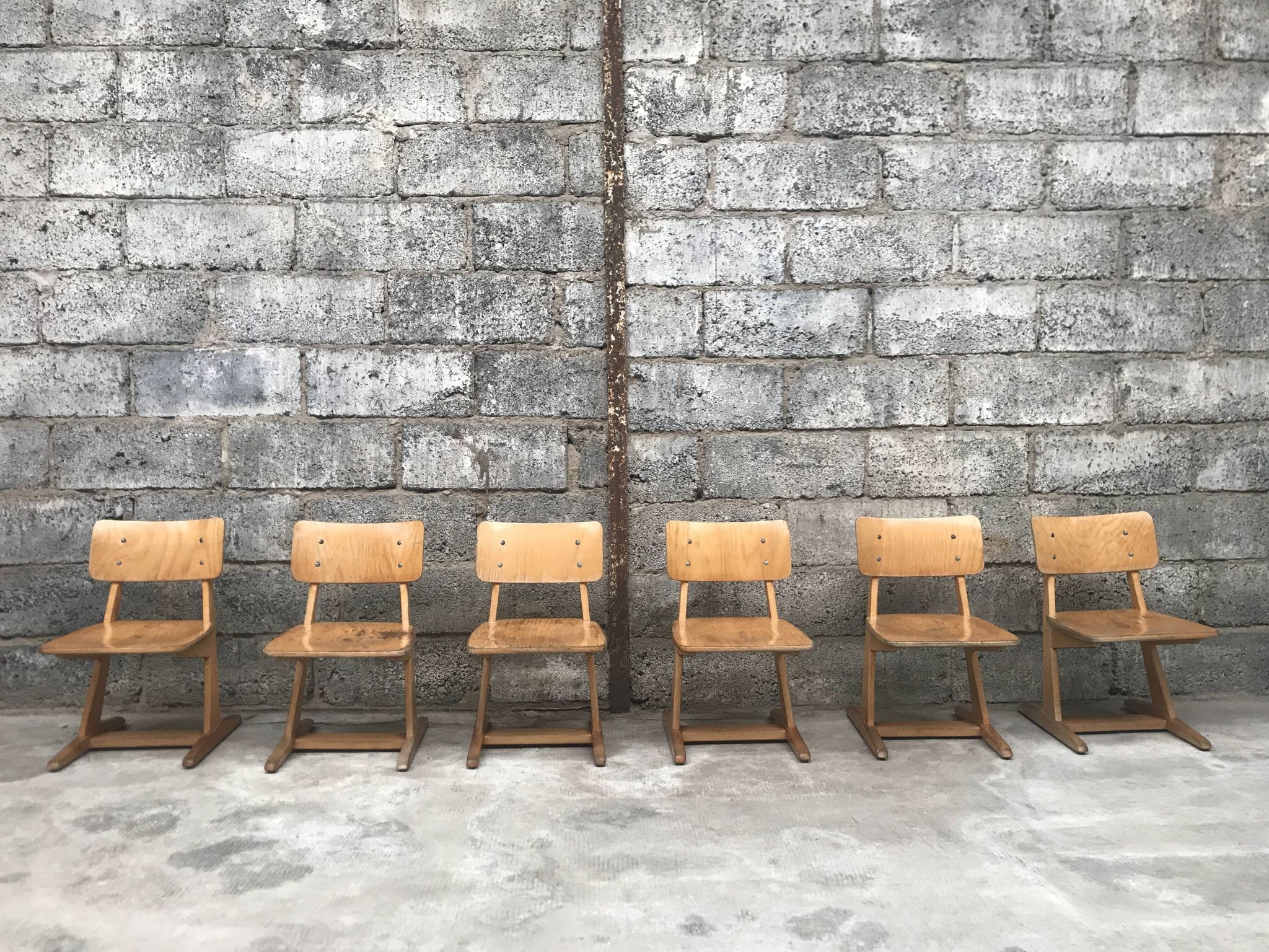 Series of 10 casala children's chairs in vintage light wood