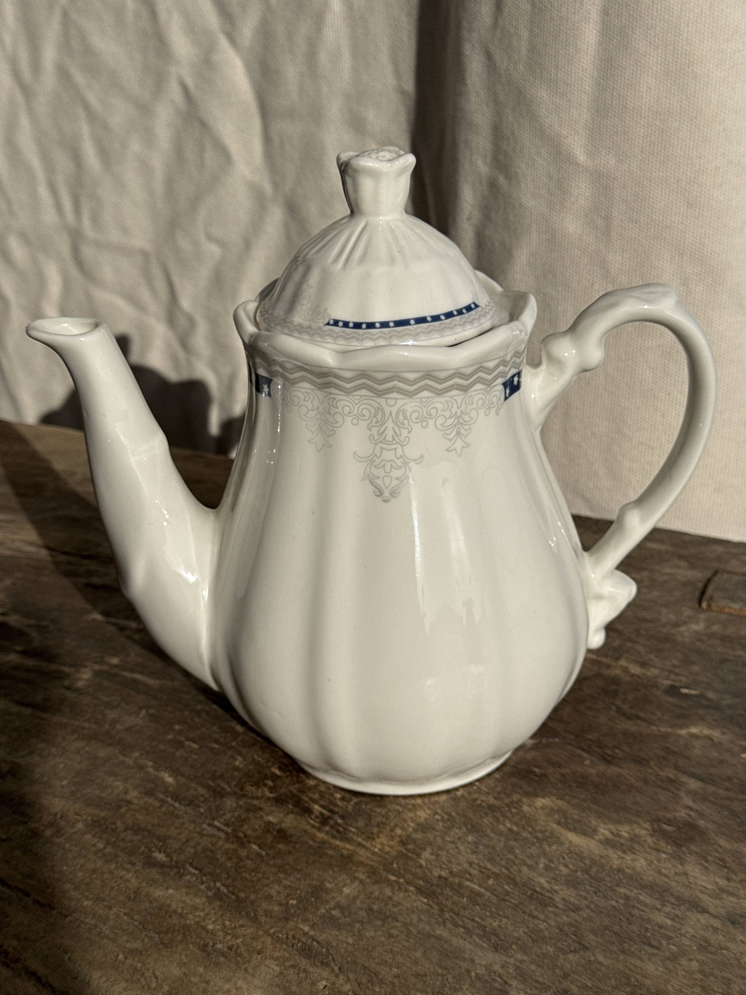 White earthenware teapot with blue and silver trim H22.5