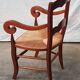 Old country armchair wood and natural straw