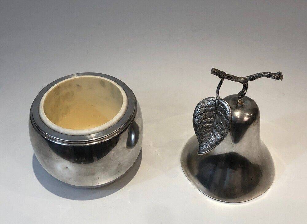 Silver-plated metal and plastic pear-shaped ice bucket.