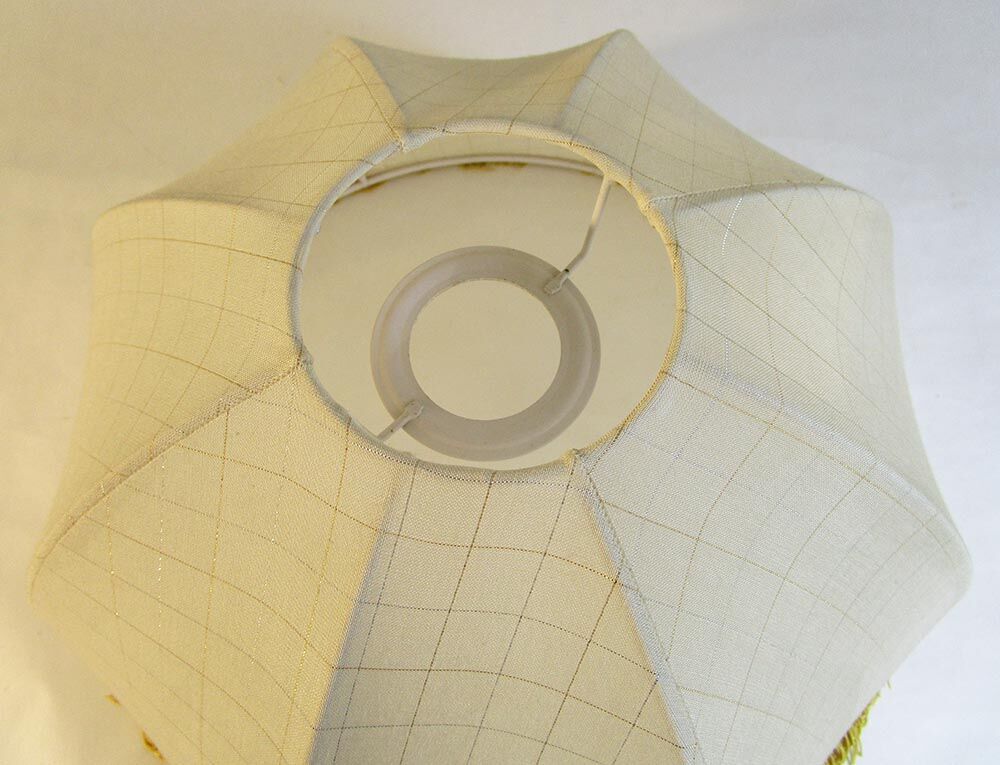 Cloth suspension with gold fringe