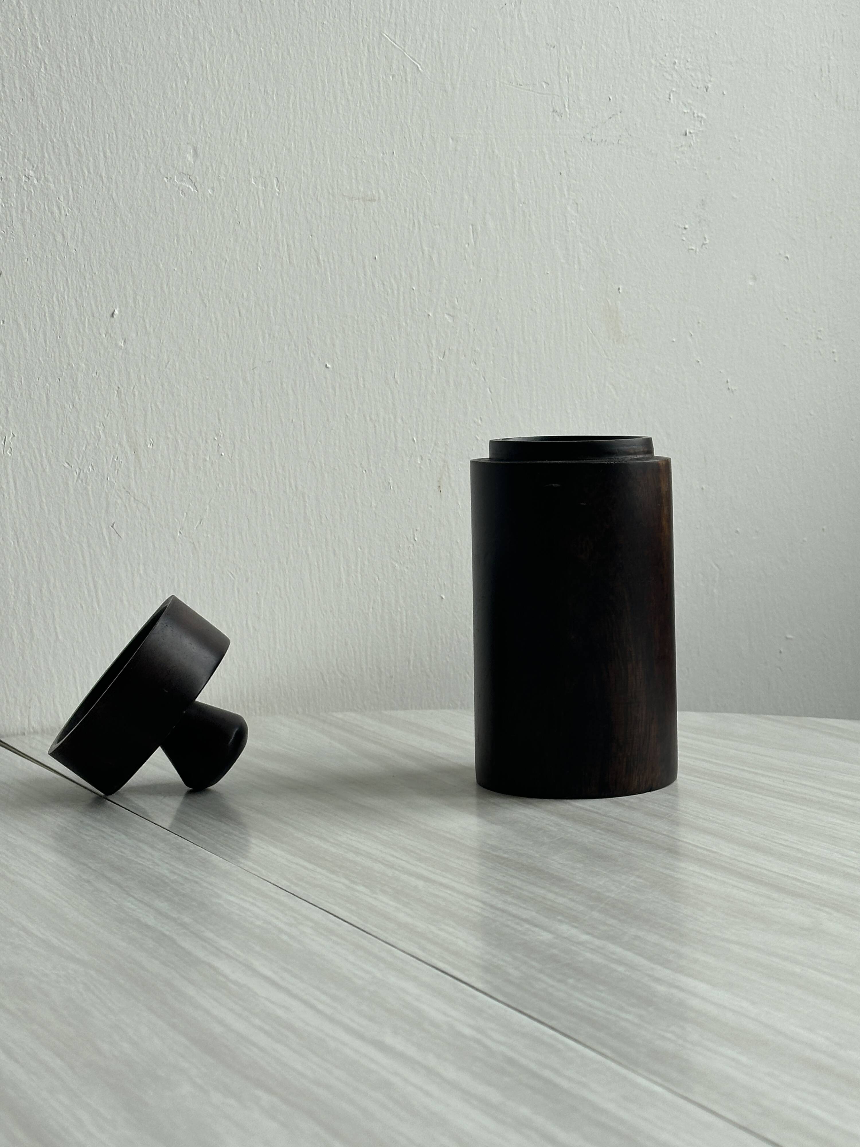 Old brutalist style wooden pot.