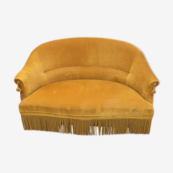 Velvet fringed sofa