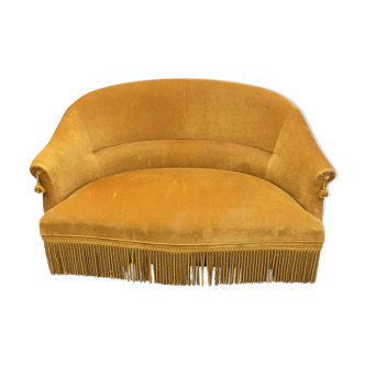 Velvet fringed sofa