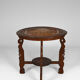 Asian coffee table carved with dragons and peacocks, Indonesia, early 20th century