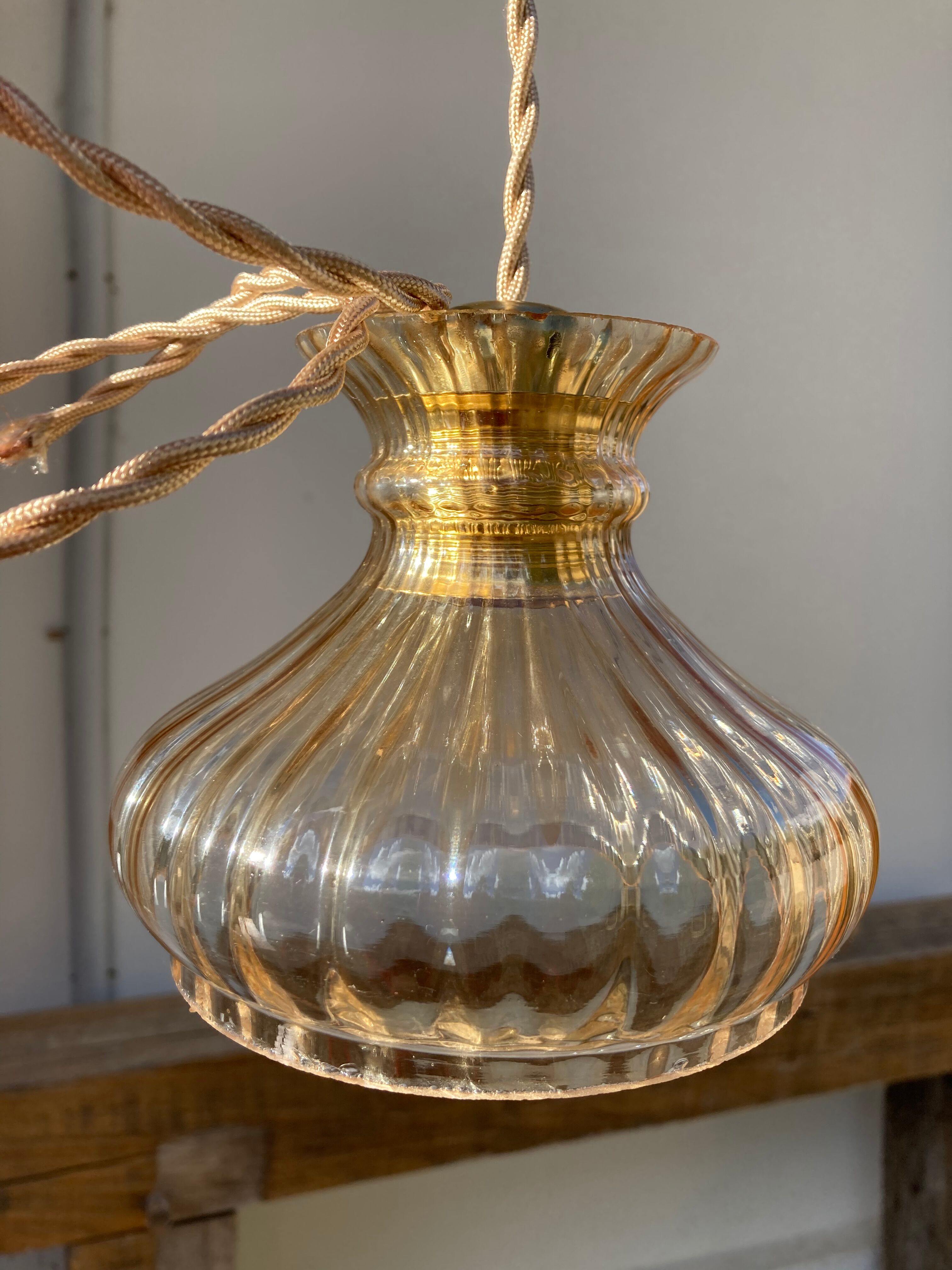 Pair of amber glass walkmen to hang in suspension