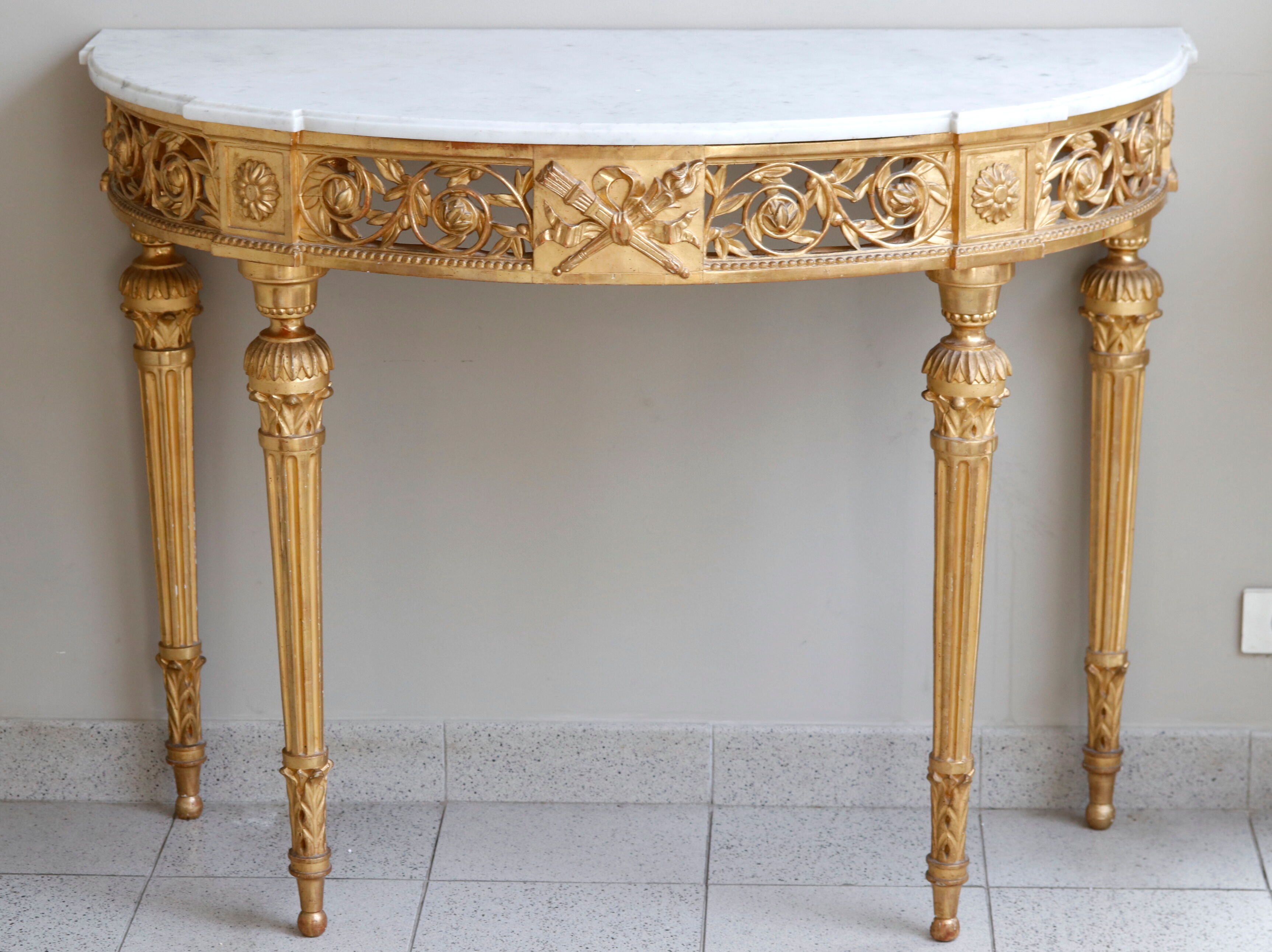 Louis XVI-style gilded wooden console, half-moon in shape