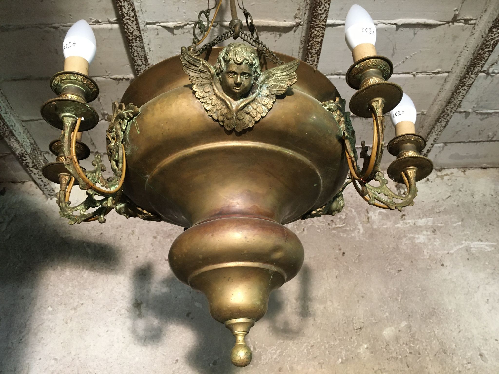 Brass chandelier with angels