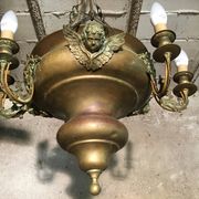Brass chandelier with angels