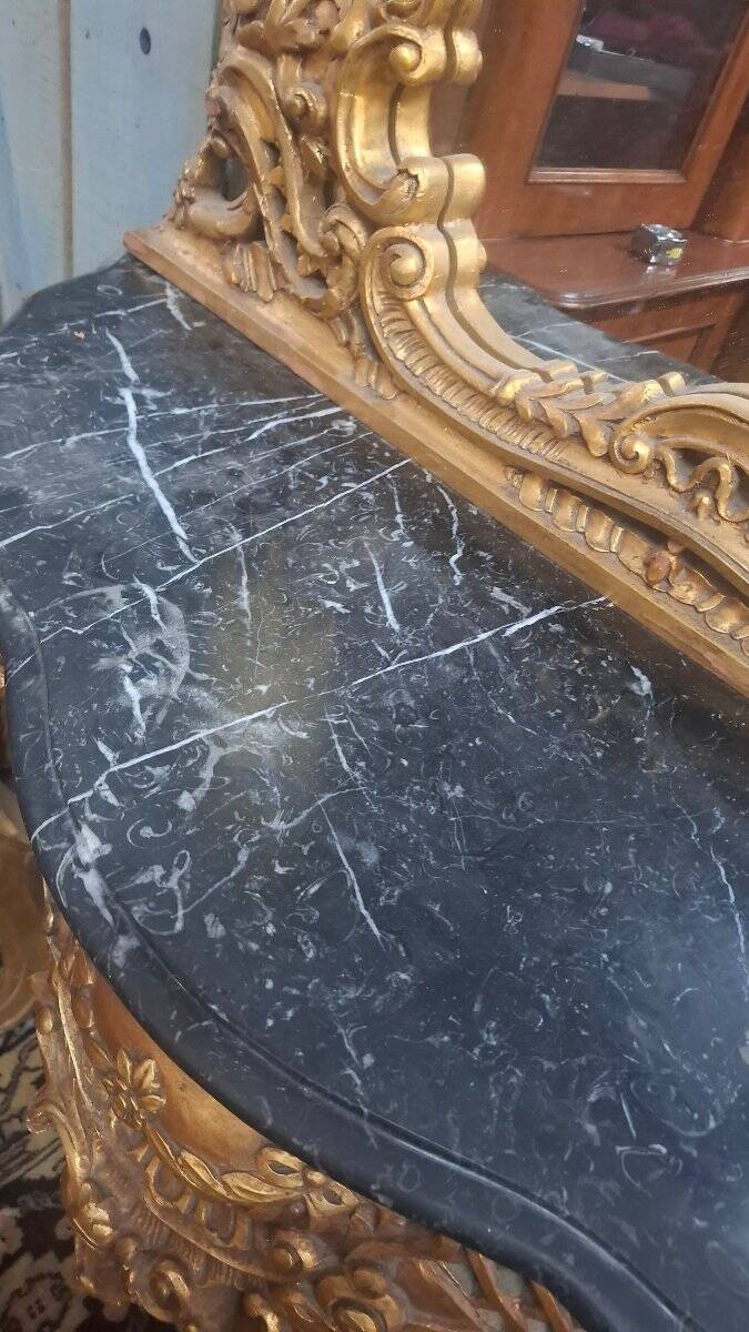 Mirror and console set in Louis XV style.