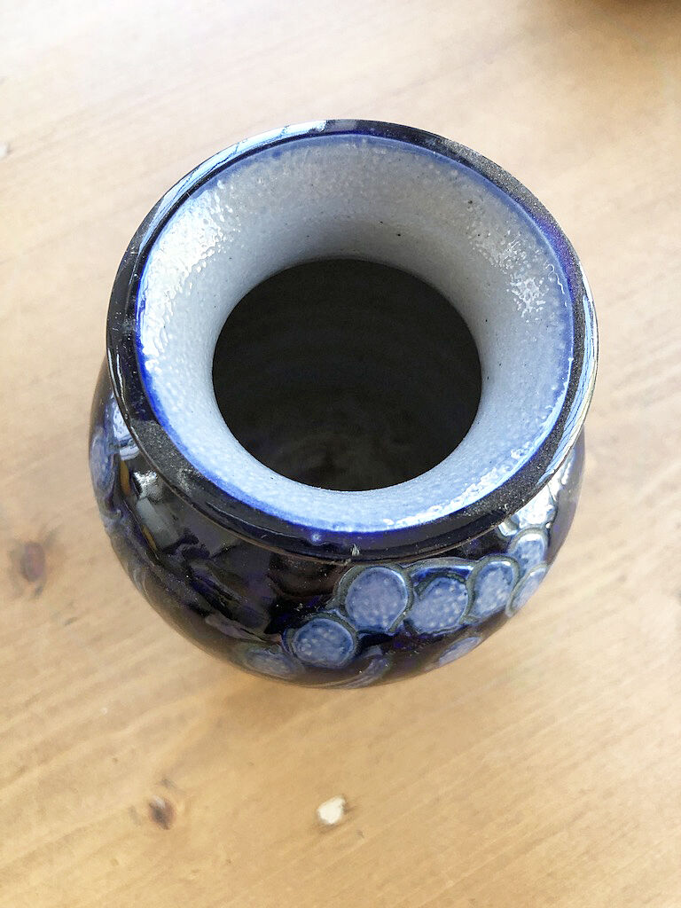 Artisan vase with floral motifs