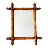 Vintage wooden mirror imitating bamboo