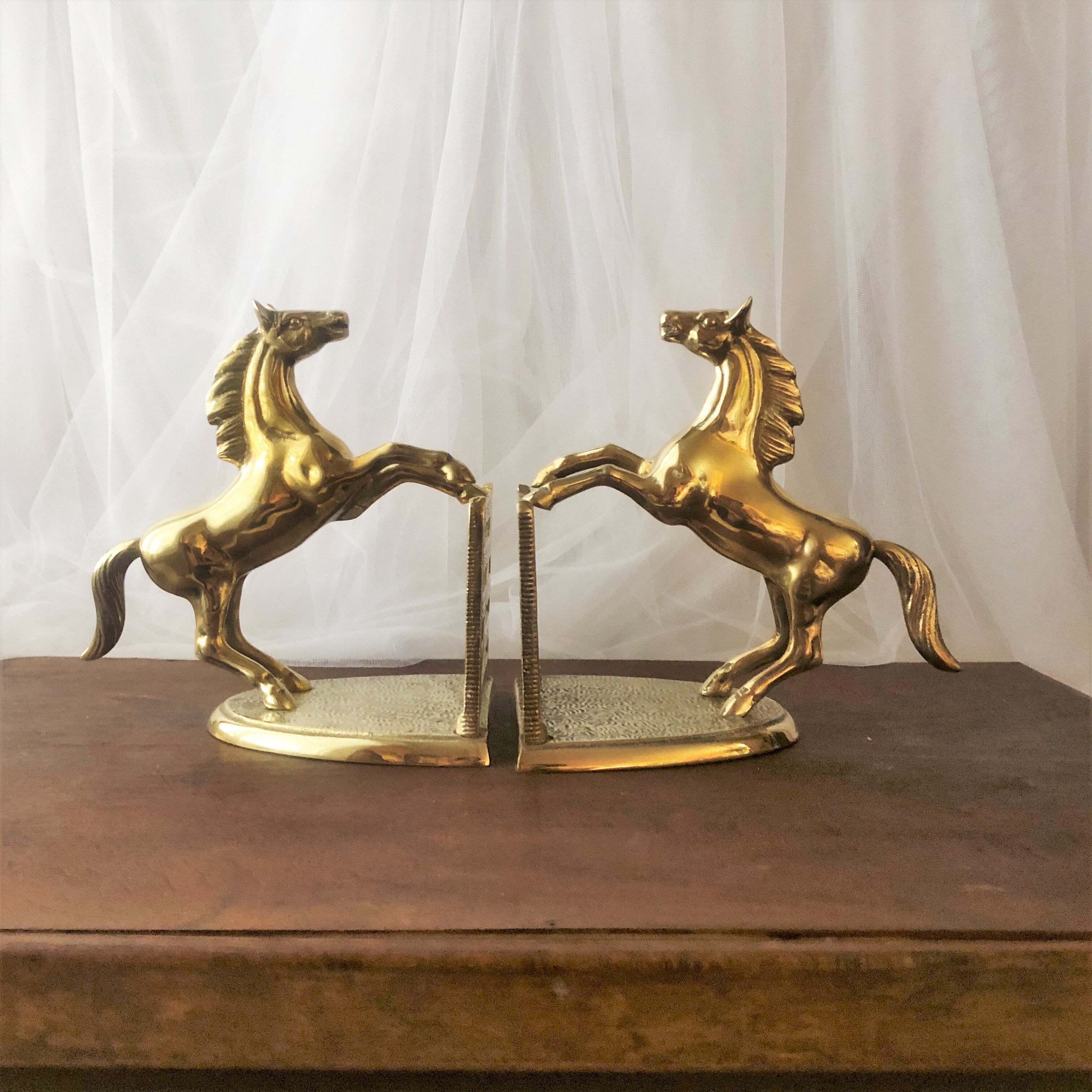 Goldeneye brass décor horses