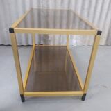Gold metal coffee table and smoked glass