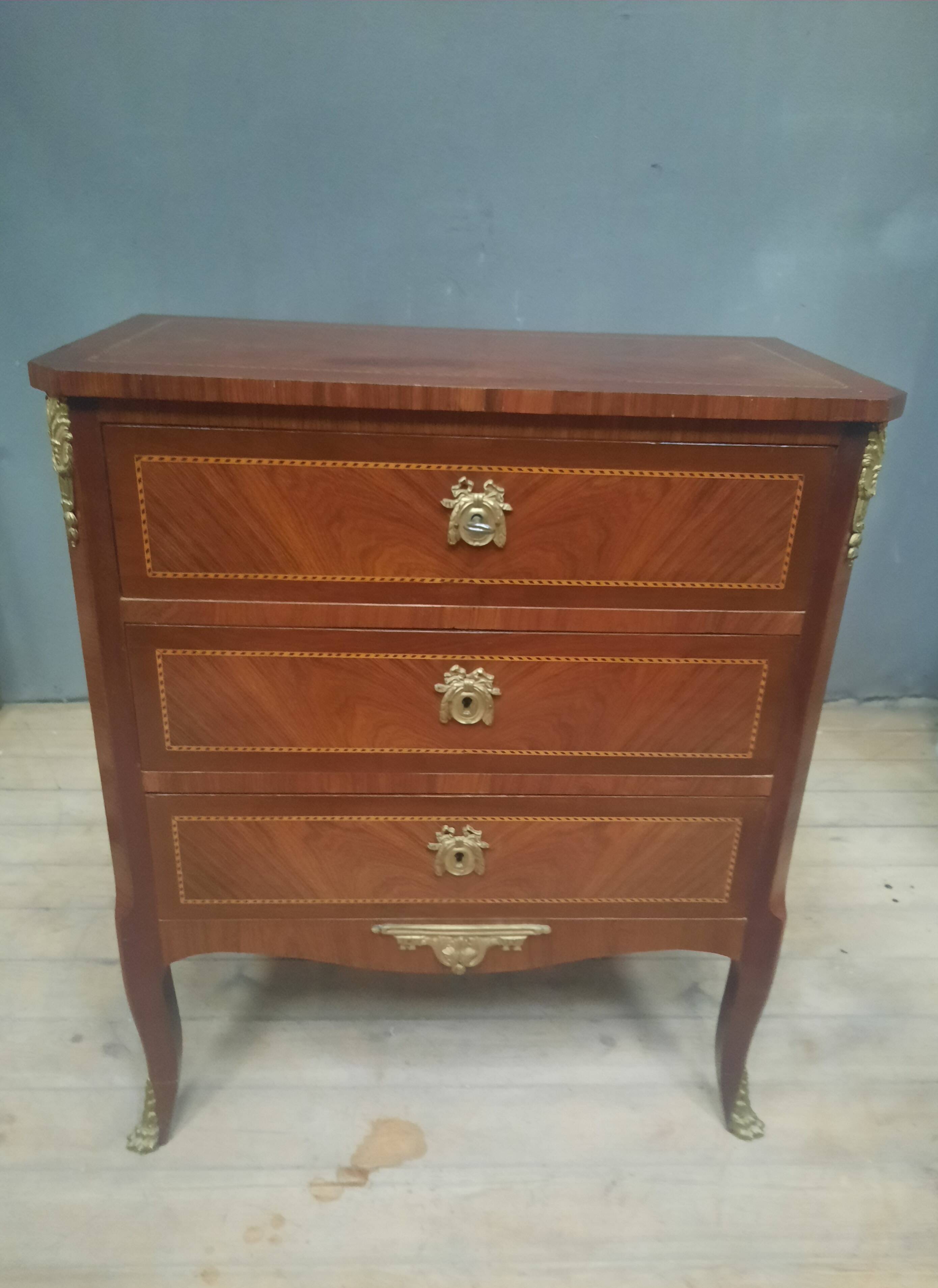 Small transitional style inlaid chest of drawers