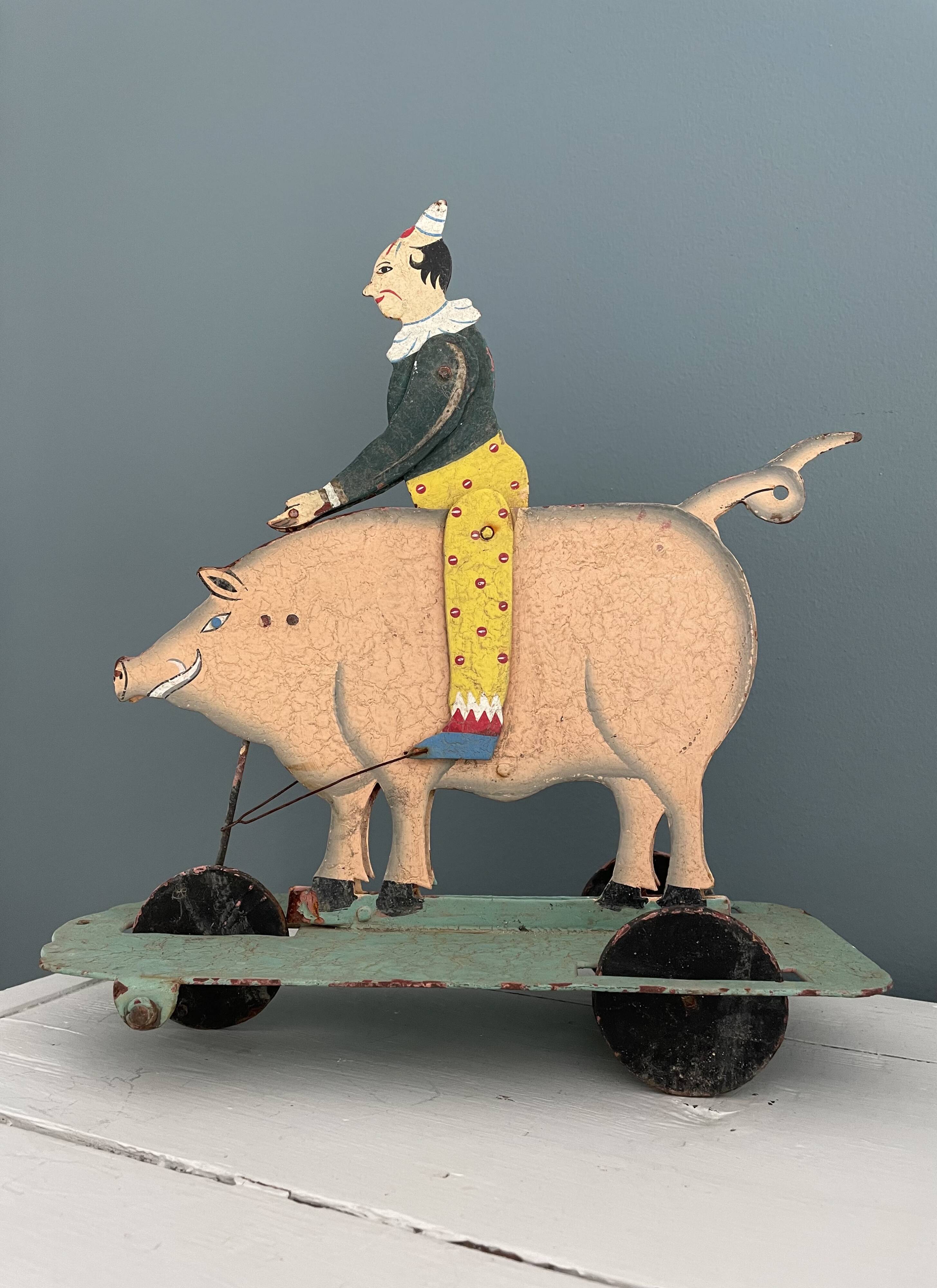 Old hand-painted metal pull toy