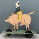 Old hand-painted metal pull toy