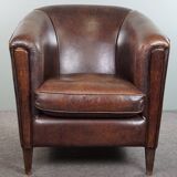 Dark sheep leather club armchair, sleek design