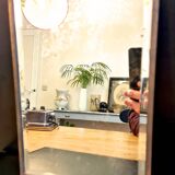 Beveled mercury mirror and japanese art nouveau illustration on the back