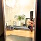 Beveled mercury mirror and japanese art nouveau illustration on the back