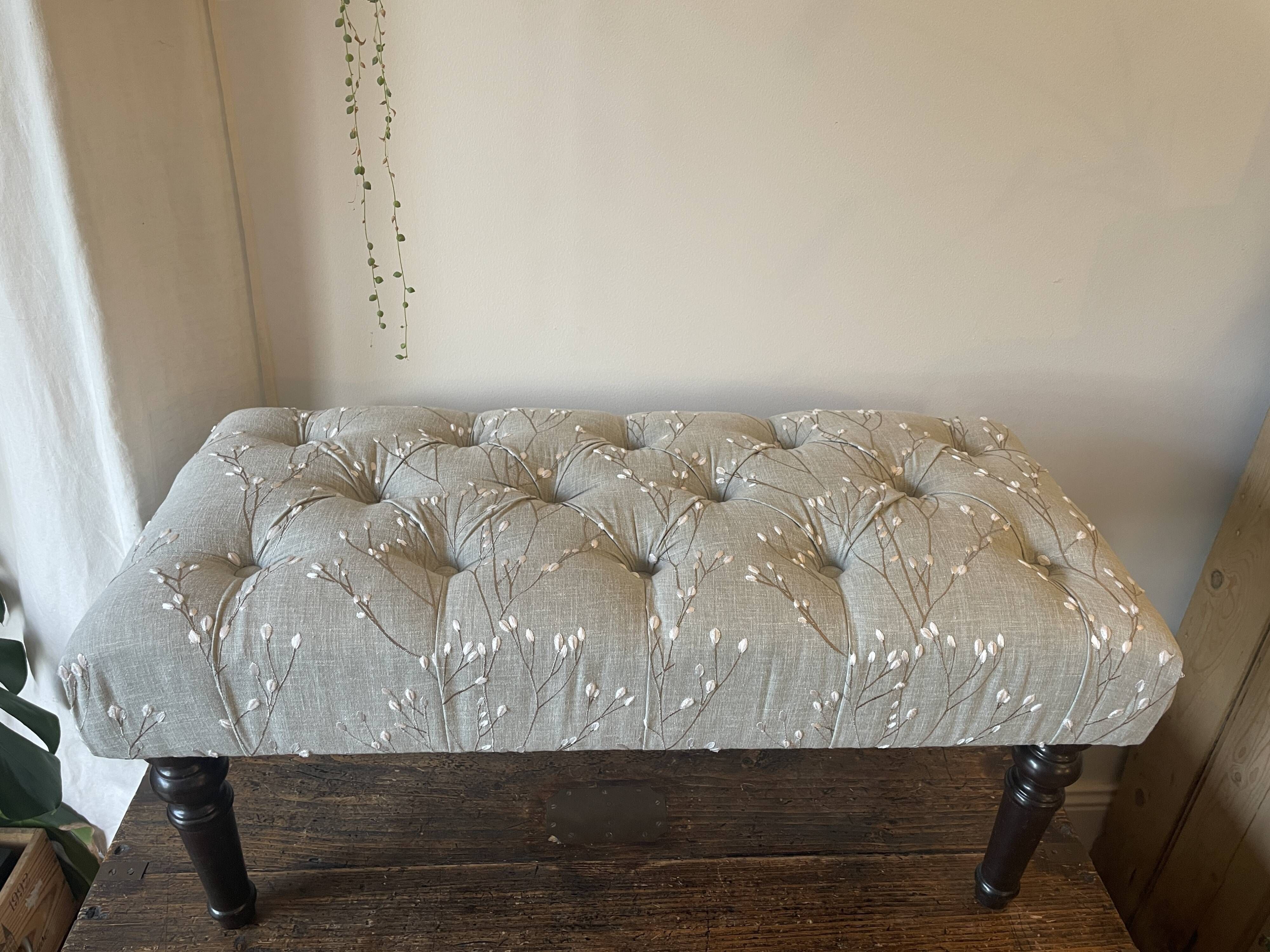 Tufted footrest