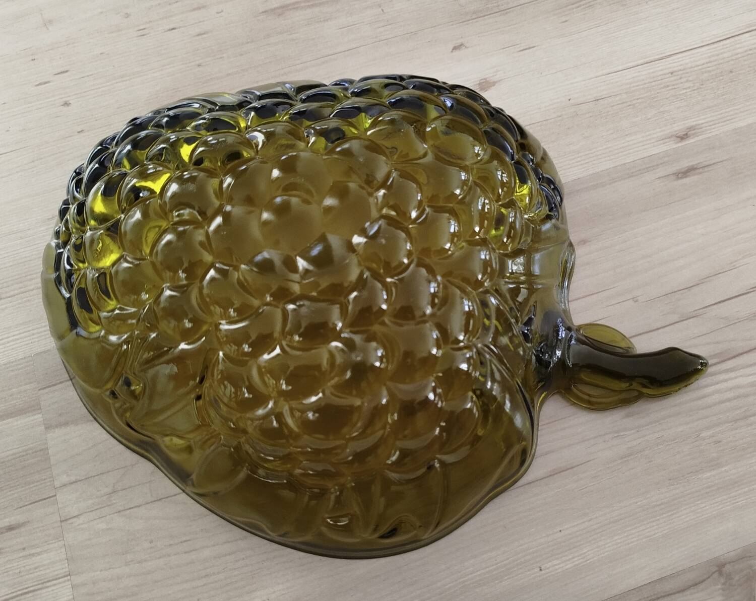 Indian green glass fruit bowl with grape decoration in strawberry shape.