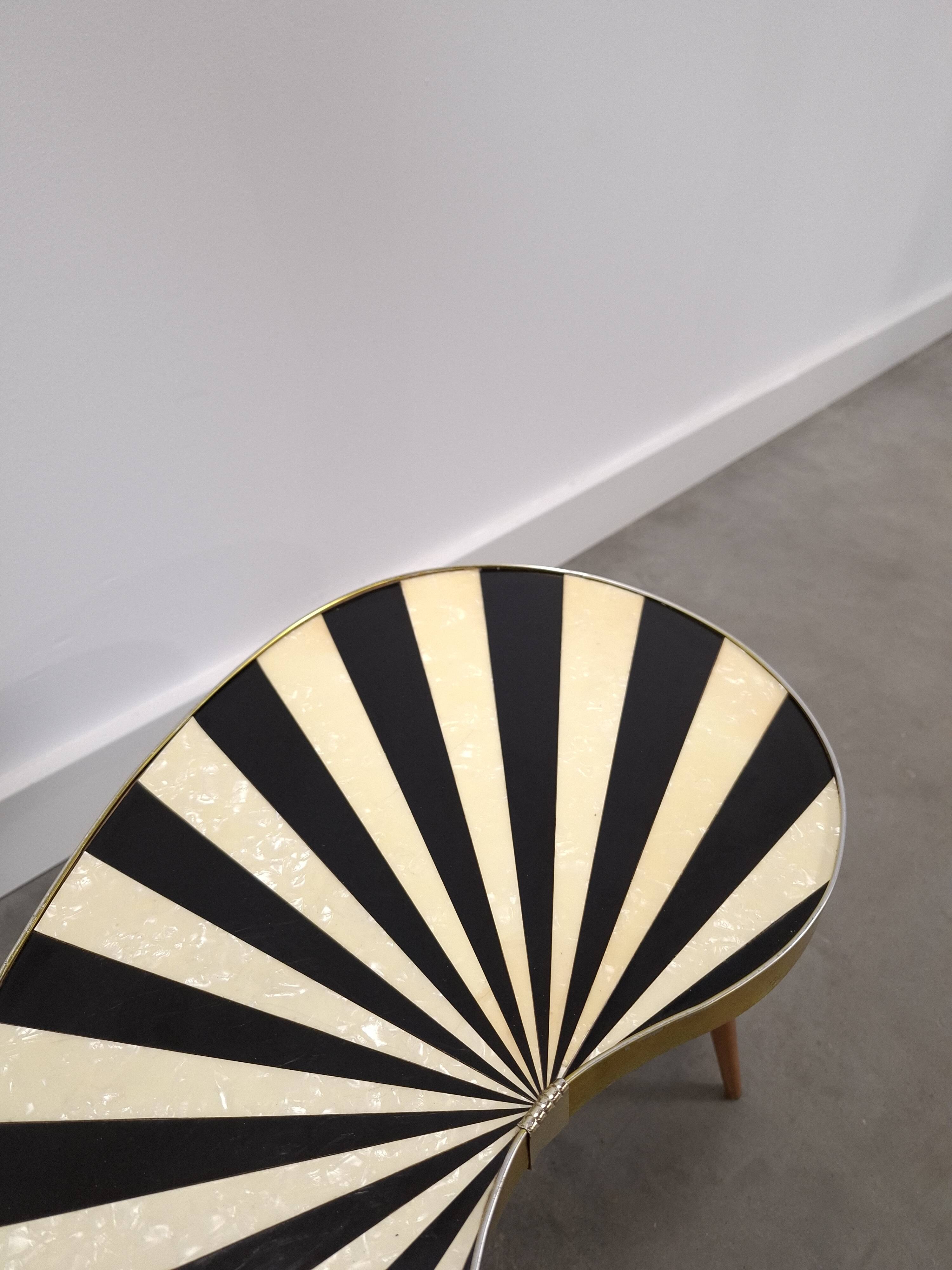 1950s kidney-shaped black and white table, plant table.