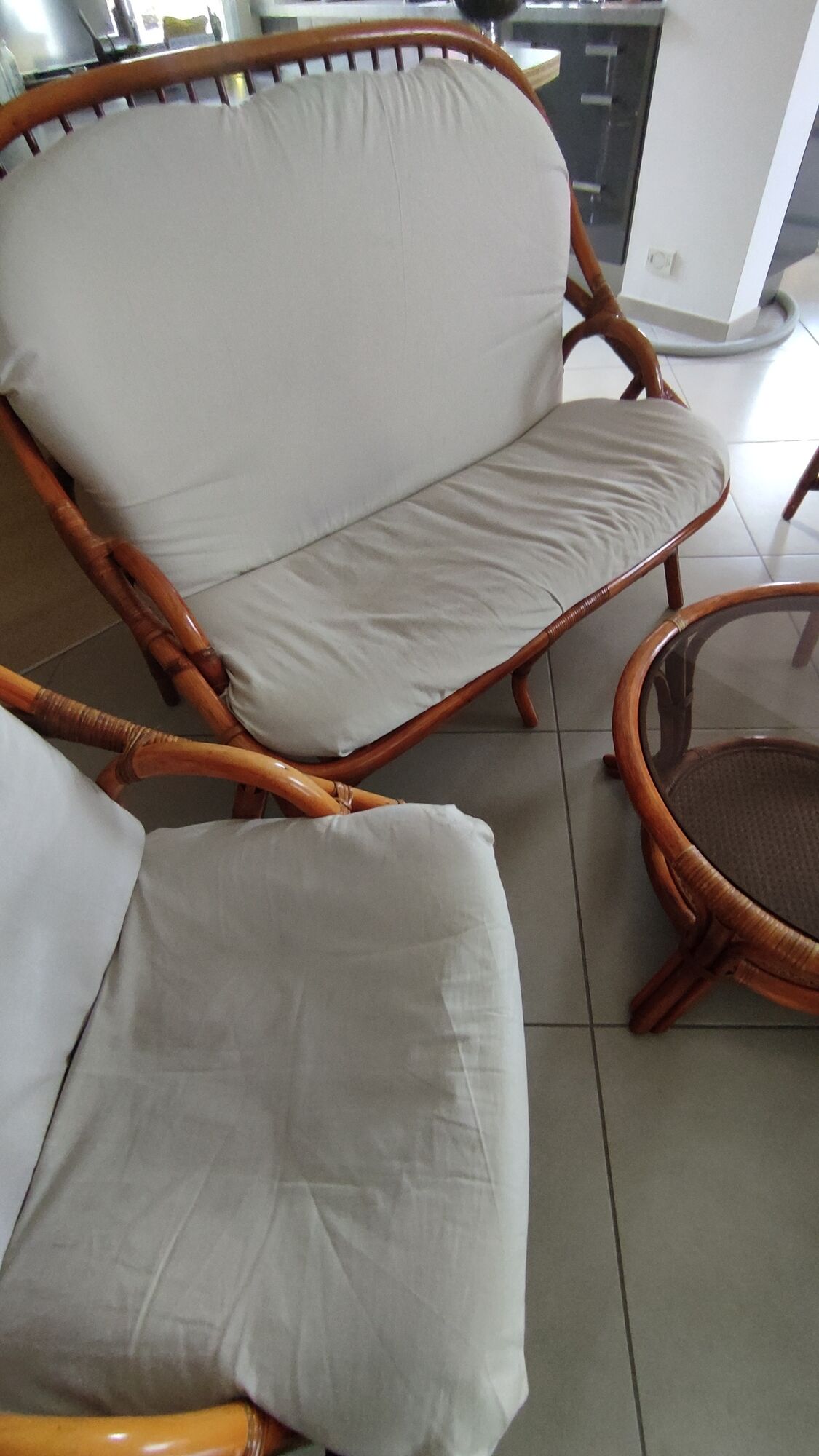 Sofa armchairs and coffee table in vintage rattan of six pieces