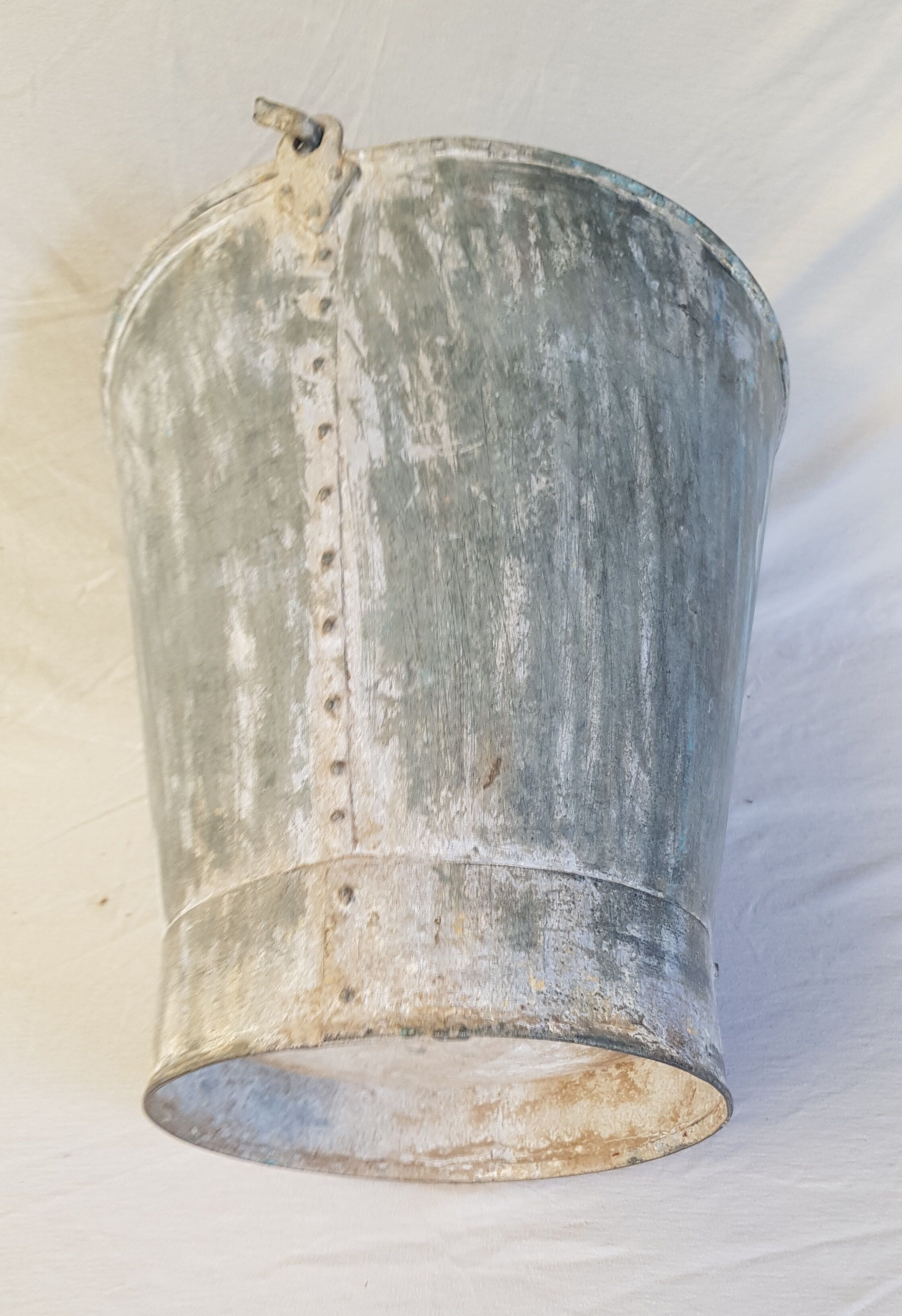 Old bucket with thick zinc handle