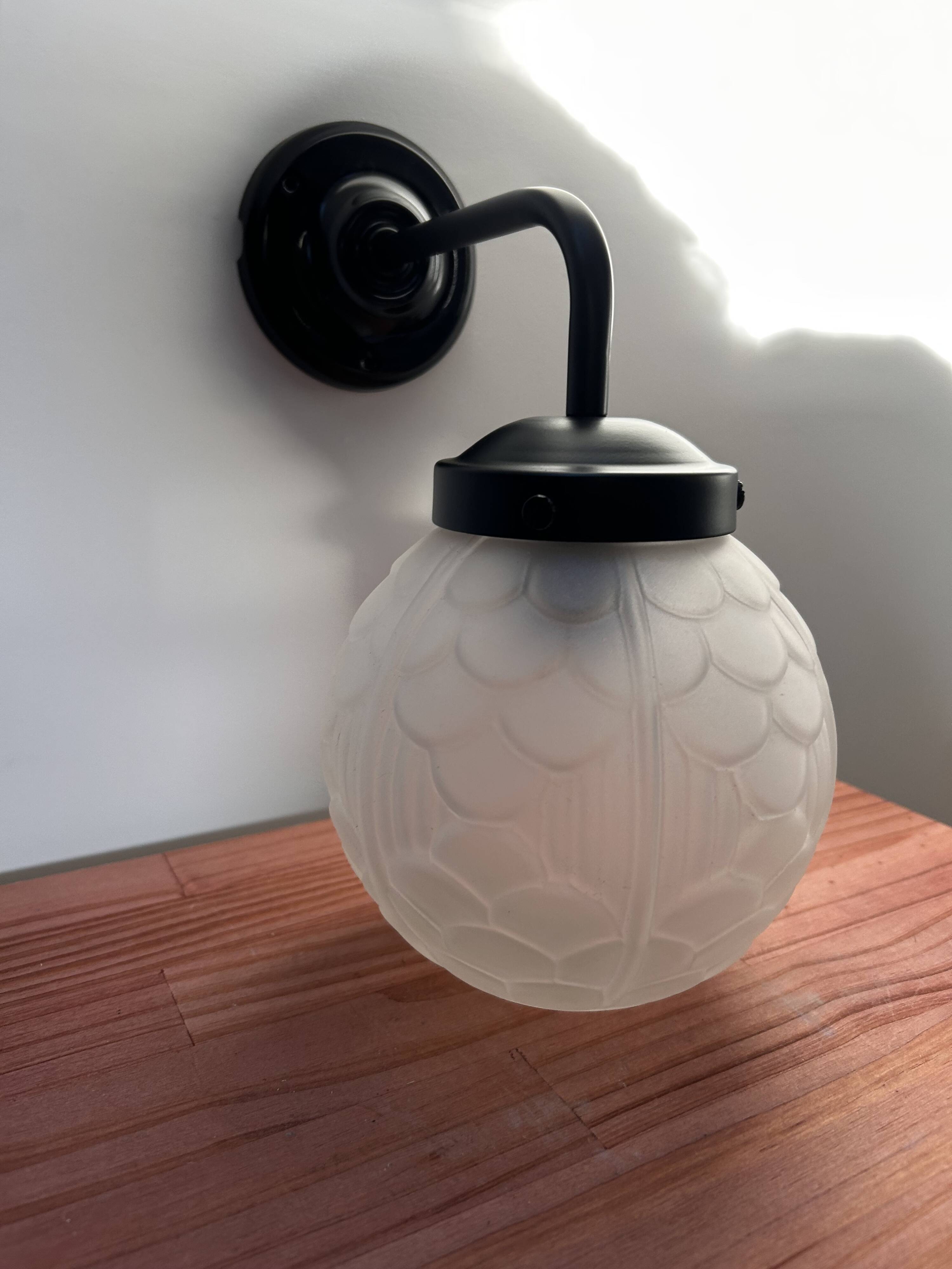 Black art deco wall light