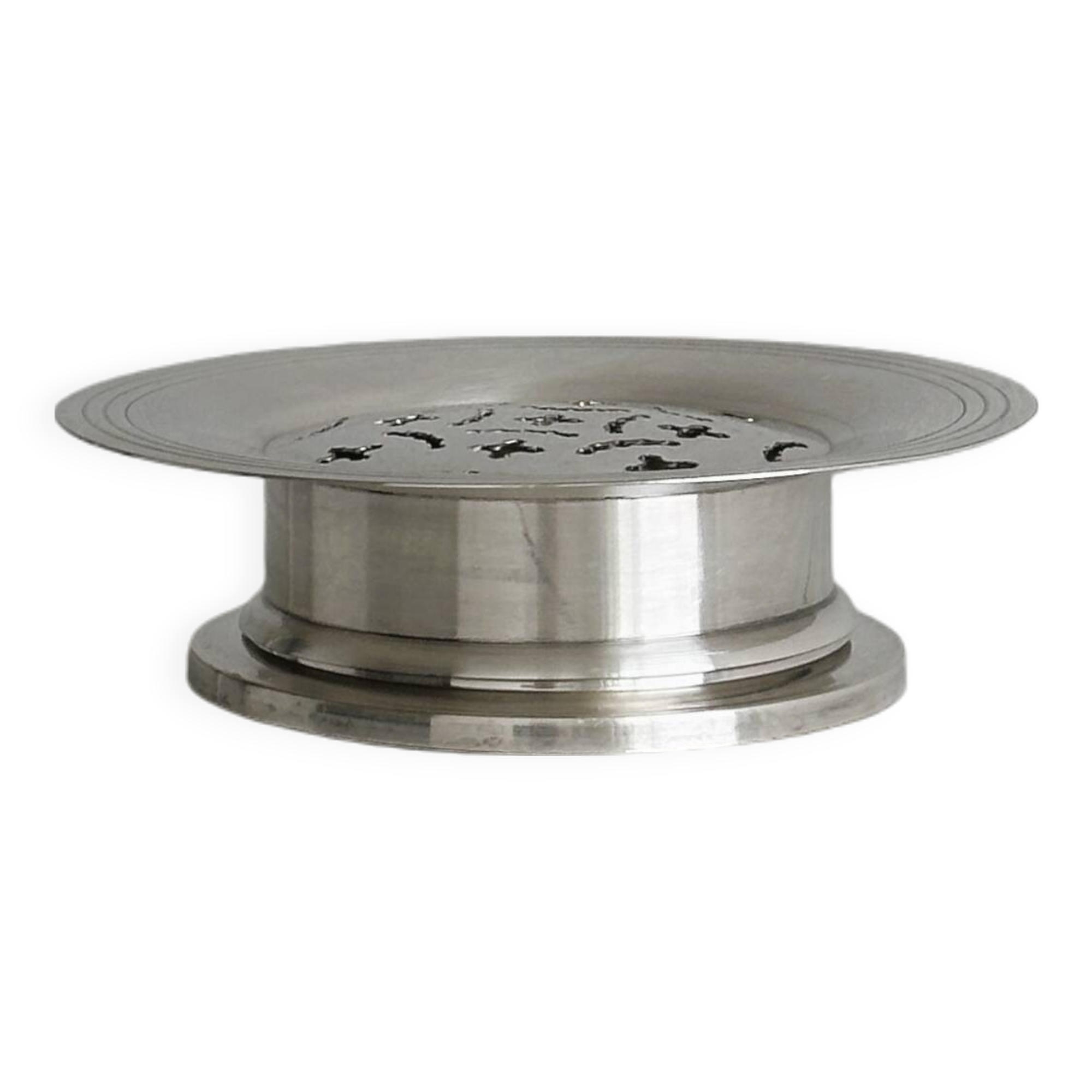 Antique butter dish in shiny metal