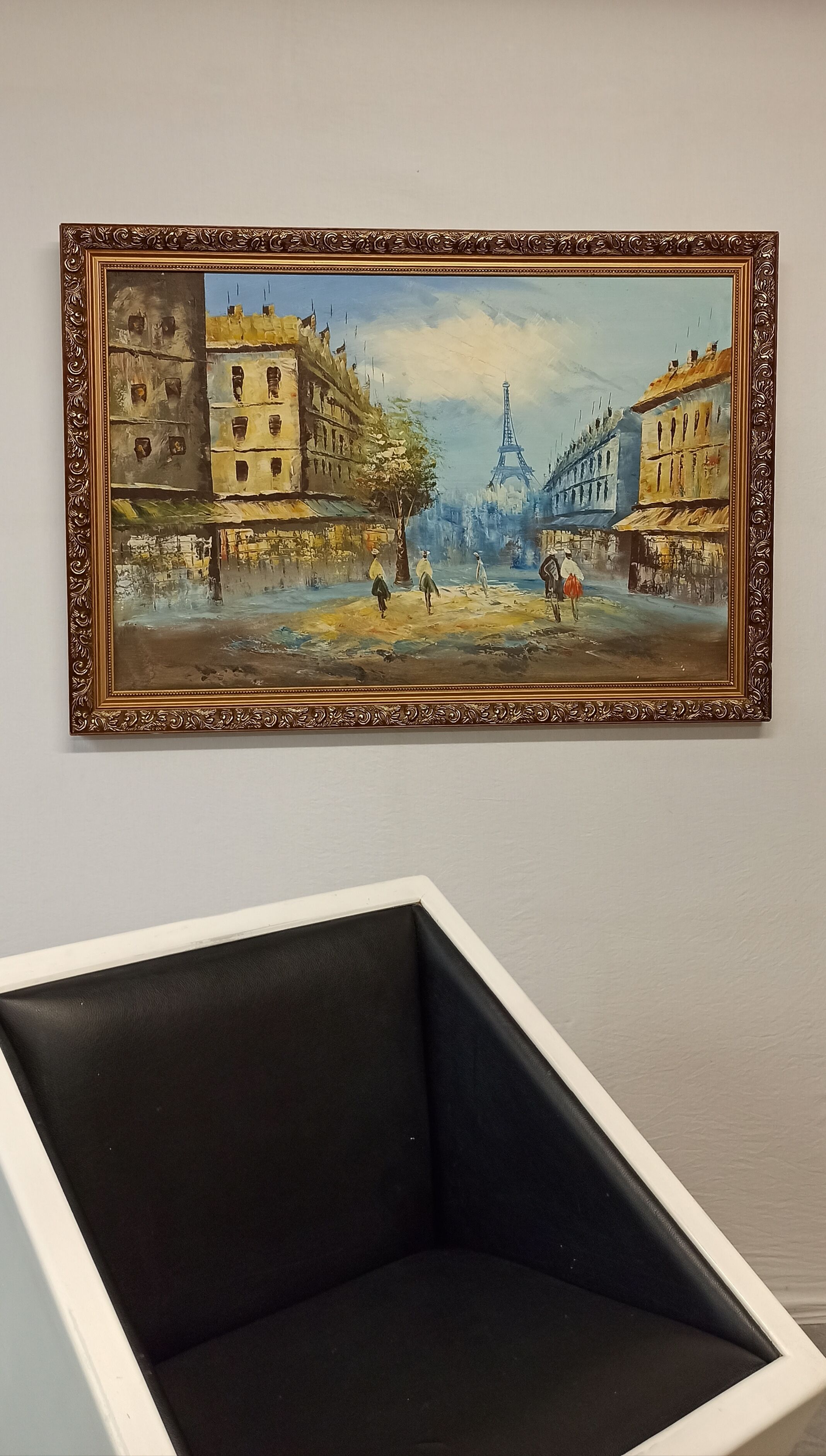 Painting framed by a view of Paris