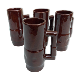 4 brown mugs