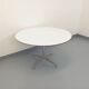 Vintage Eames round table for Vitra in white melamine, wood, and metal.