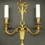 Paire d'appliques au noeud style Louis XVI - bronze