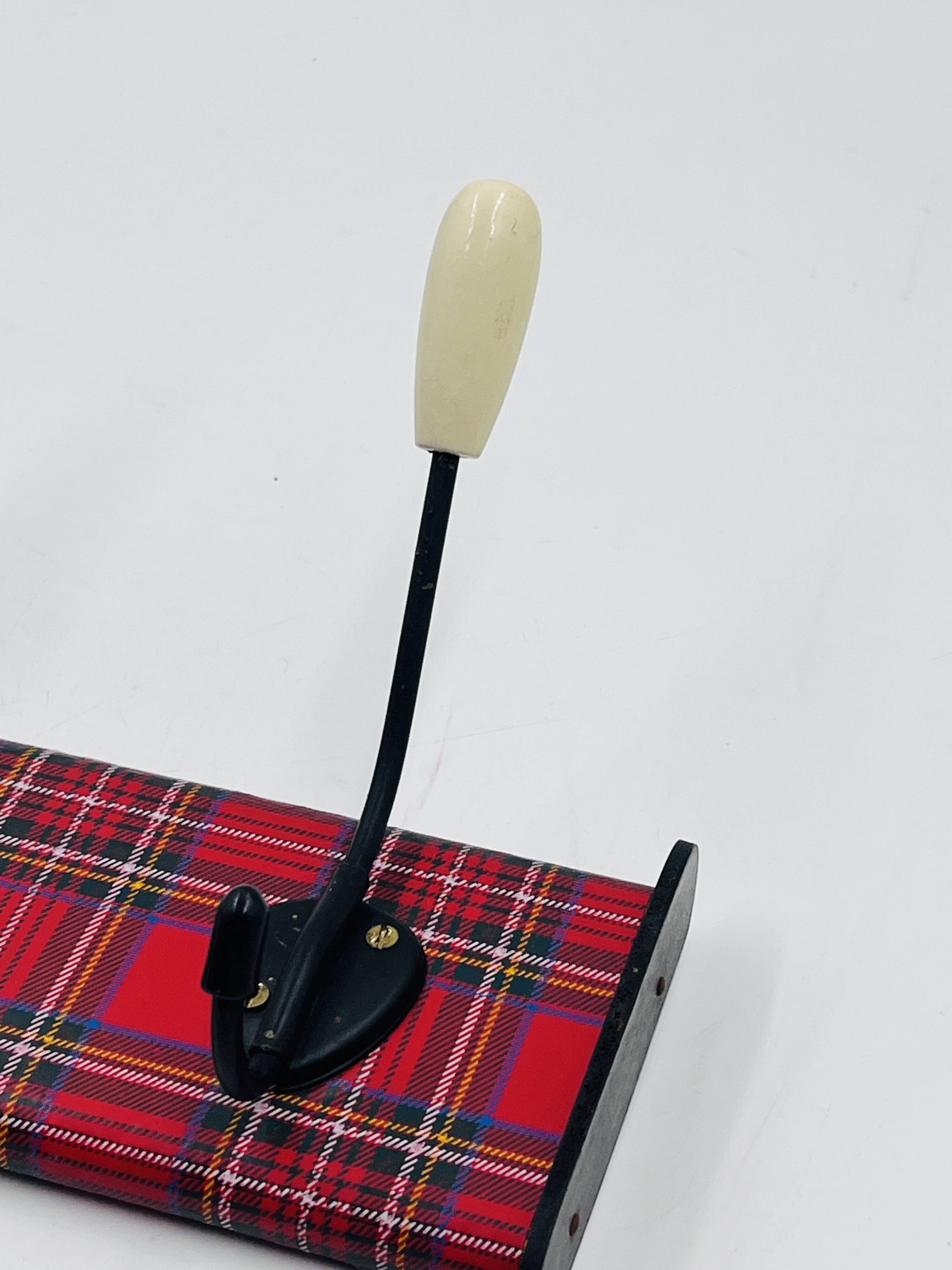 Vintage red Scottish coat rack from the 1970s.