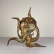 Brutalist metal octopus wall lamp by Salvino Marsura, Italy, 1980s.