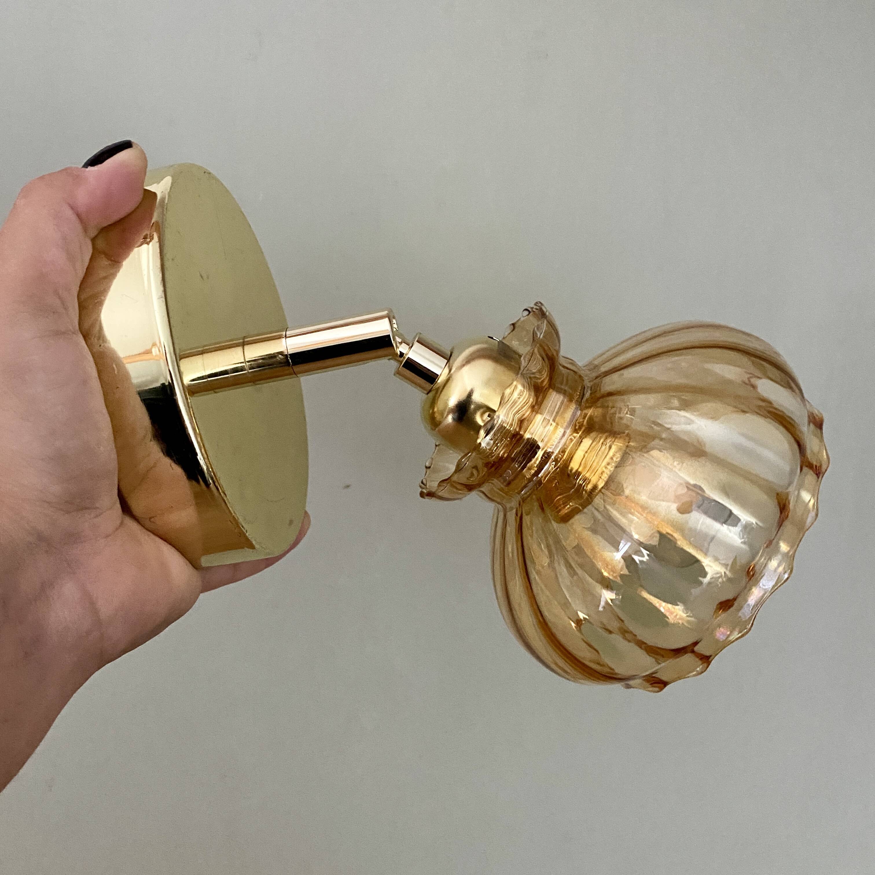 Vintage amber glass globe wall light