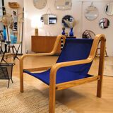Scandinavian curved wooden armchairs