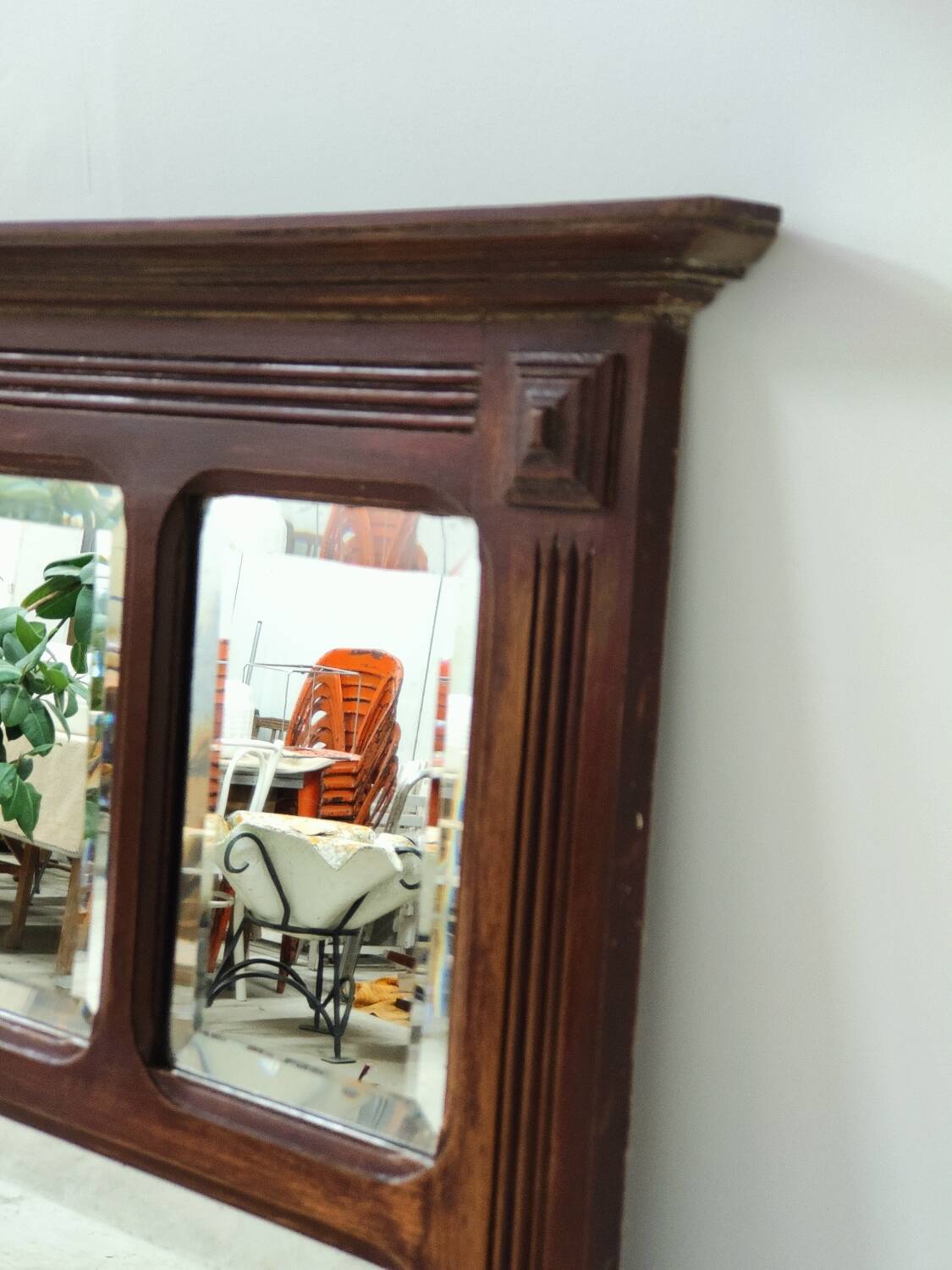 Antique beveled mirror on a wooden frame, 1930