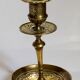 Duo of solid brass and gold metal candle holders worked old
