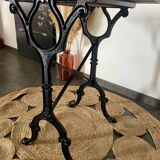Bistro table with iron legs and raw wood top