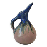 Vase, or pitcher, in enamelled stoneware with a bird's head, circa 1920