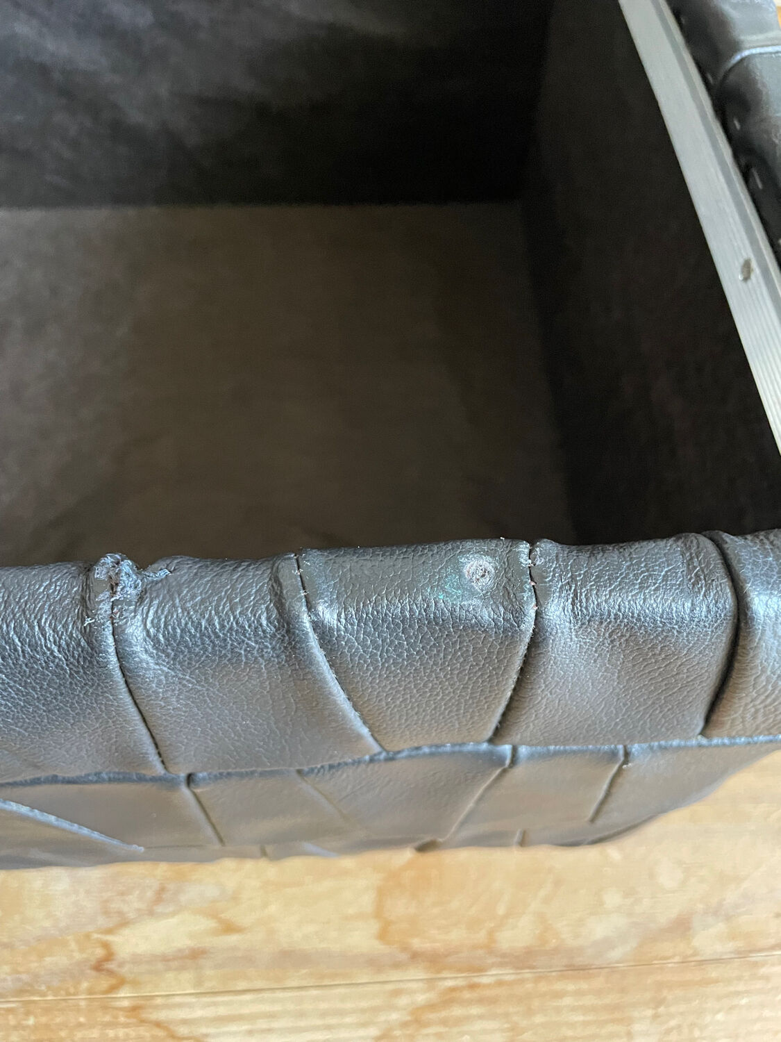 Black leather chest ottoman from Sède