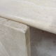 Table basse oeil en travertin 77X127 cm
